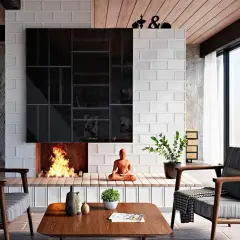 Moderne Kamin Ideen Wohnzimmer: Ein gemütliches Wohnzimmer mit Kamin, der mit schwarzen und weißen Fliesen verkleidet ist. Ein Buddha sitzt vor dem Kamin.