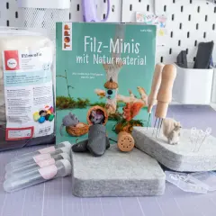 Filz-Minis mit Naturmaterial: Ideen für niedliche Filzfiguren. Wolle, Nadeln und Werkzeuge für kreative Filzprojekte.