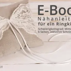 E-Book-Anleitung: Ringkissen Hochzeit selber machen. Ein liebevoll gestaltetes Kissen mit Spitze und Bändern, perfekt für den großen Tag.
