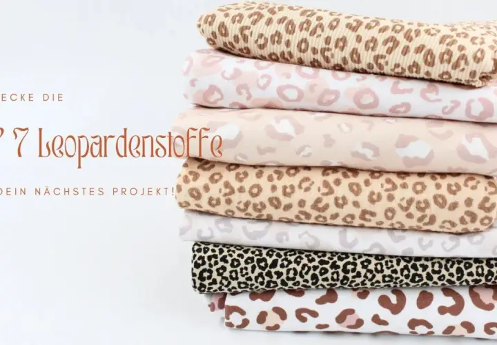 Stapel von Stoffen mit Leopardenmuster in verschiedenen Farben und Größen. Ein Stofflexikon für deine nächsten Nähprojekte.