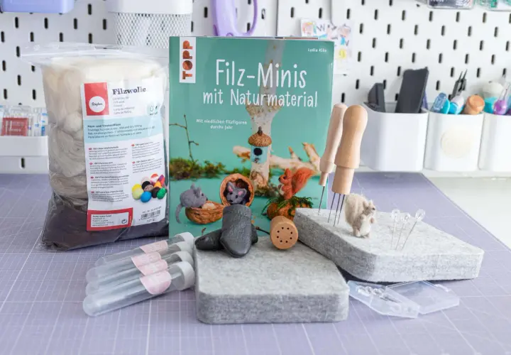Filz-Minis mit Naturmaterial: Ideen für niedliche Filzfiguren. Wolle, Nadeln und Werkzeuge für kreative Filzprojekte.