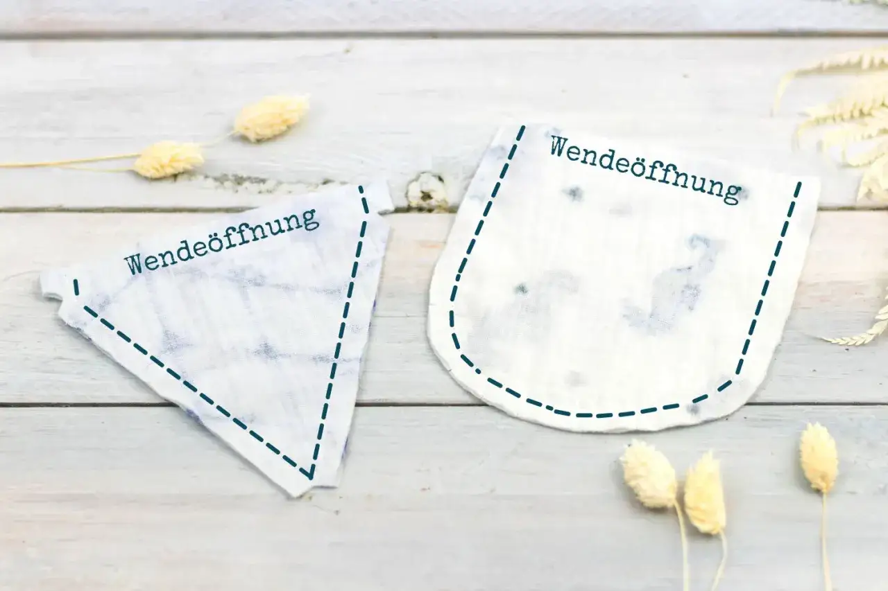 Schnittmuster f&uuml;r eine Wimpelkette: Stoffteile mit gestrichelten Linien und 