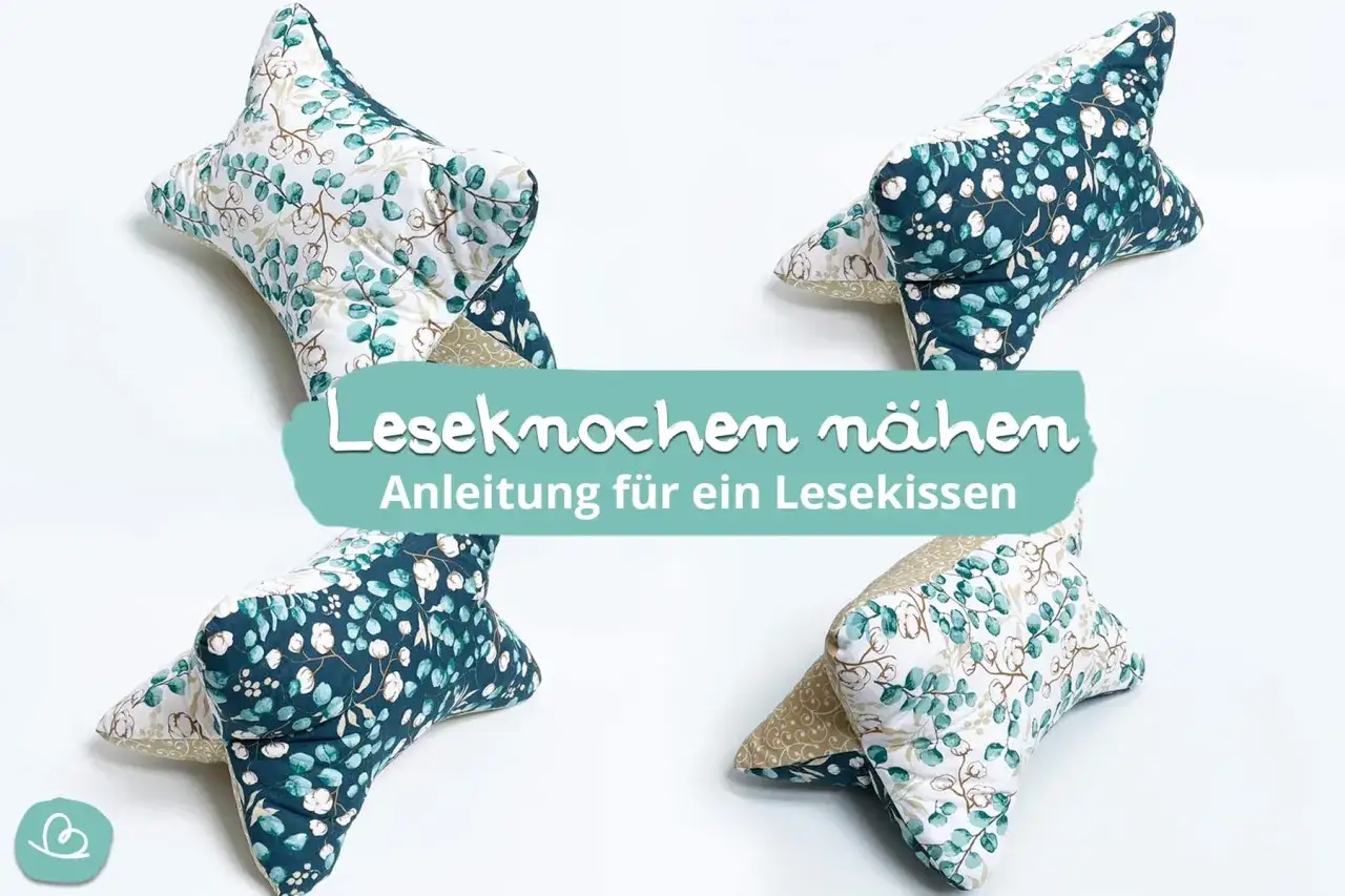 Vier Leseknochen-Kissen mit floralem Muster. Anleitung zum N&auml;hen eines Lesekissens.